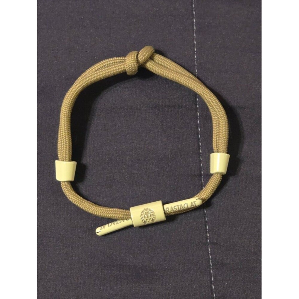 RASTACLAT KNOTTED SHOELACE BRAIDED PULL TO CLOSE BRACELET.